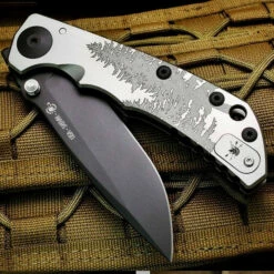 Spartan Blades Harsey Folder Special Edition Fir Trees Titanium 4" CPM S45VN Blade SF5GFIRTREES -KNIFECOMMAND Sales SPARTAN HARSEY FIR TREE IG 98404.1630617208.1280.1280