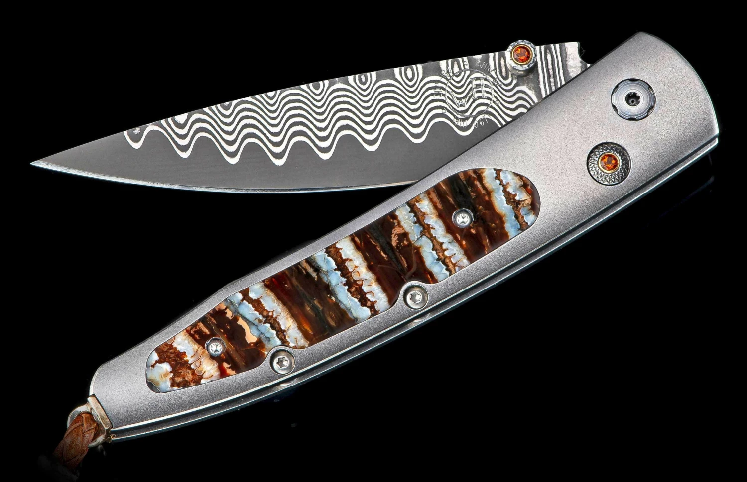 Reverso Titanium Pocketknife Featuring Fossil Mammoth Tooth And 'wave' Damascus Blade 3 Reverso Titanium Pocketknife Featuring Fossil Mammoth Tooth And 'wave' Damascus Blade