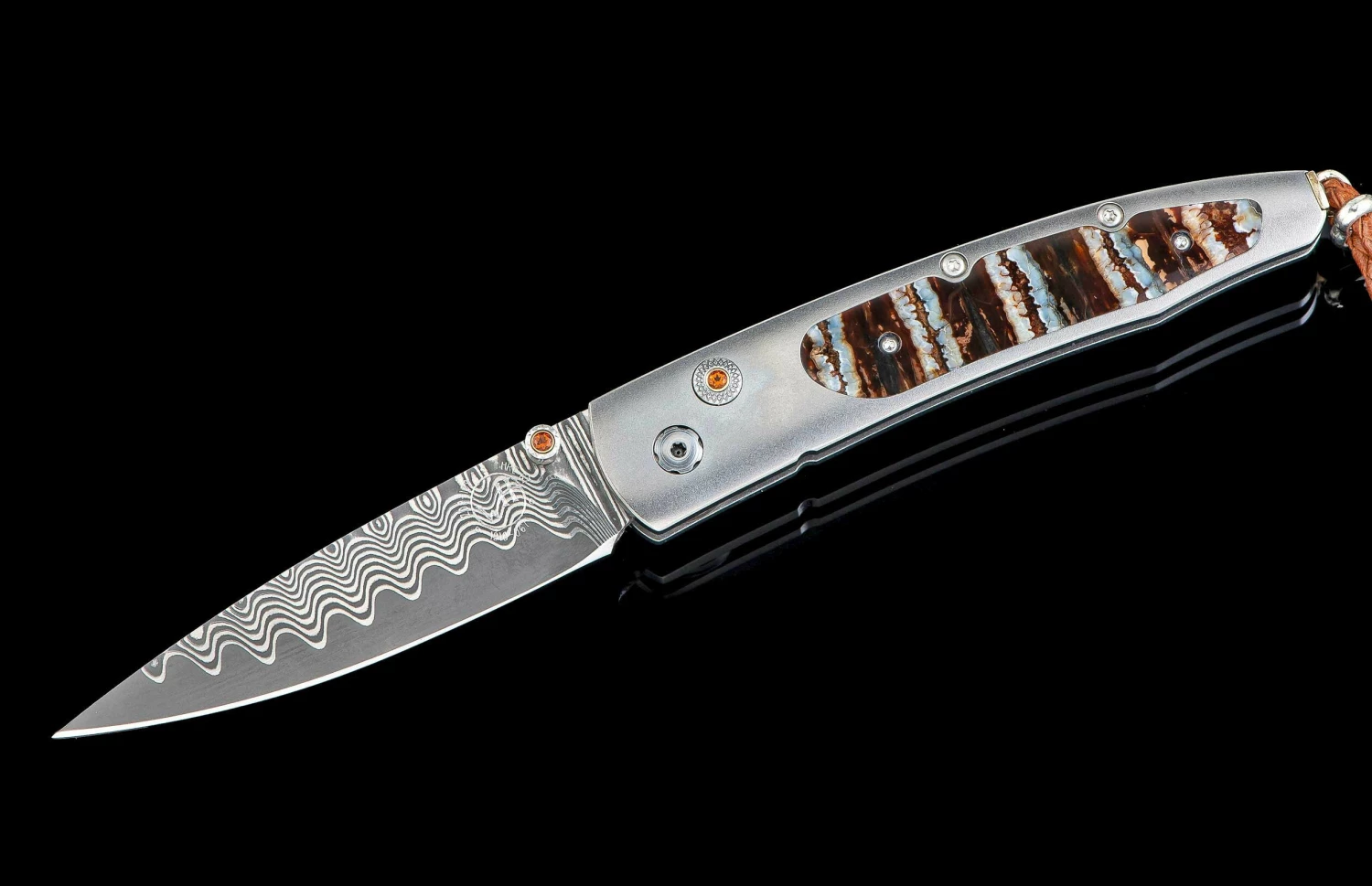 Reverso Titanium Pocketknife Featuring Fossil Mammoth Tooth And 'wave' Damascus Blade 4 Reverso Titanium Pocketknife Featuring Fossil Mammoth Tooth And 'wave' Damascus Blade - Image 2