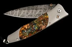 Mardi Gras Titanium Pocketknife With Damascus Blade And Mini Pine Cones In Resin 